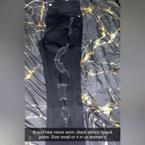 Black ripped skinny jeans